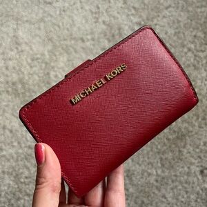 Ruby red multi-slot Michael Kors small leather wallet